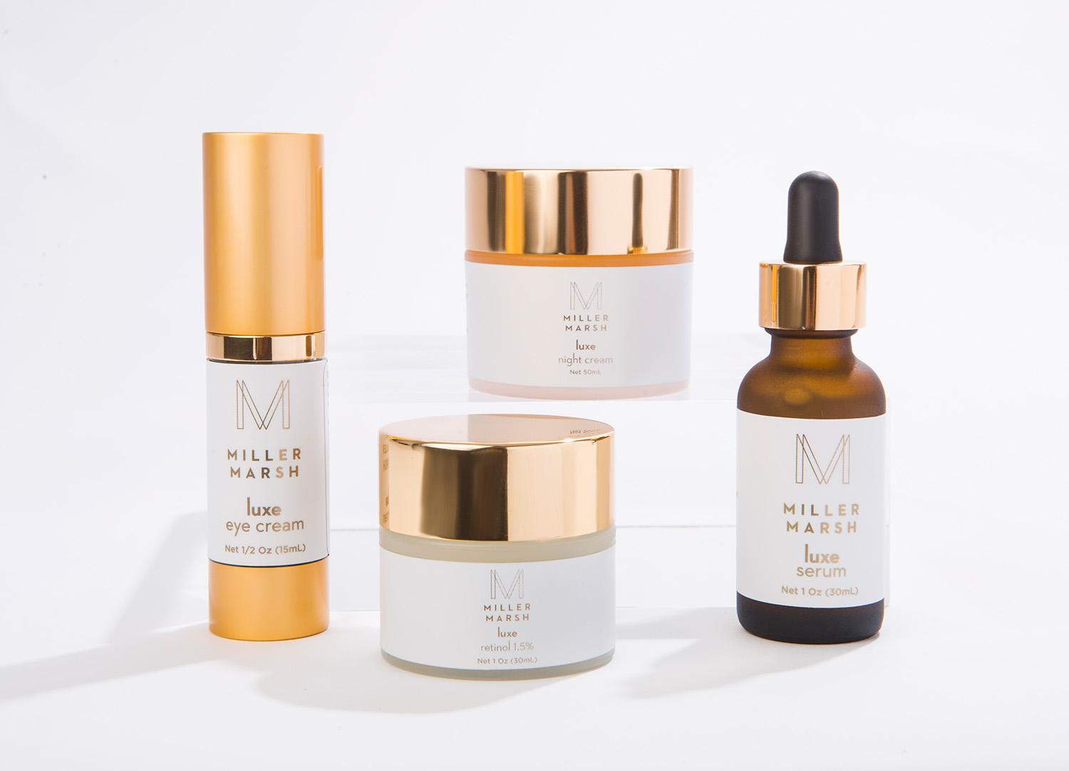 A group of Miller Marsh Luxe products including eye cream, night cream, retinol, and serum